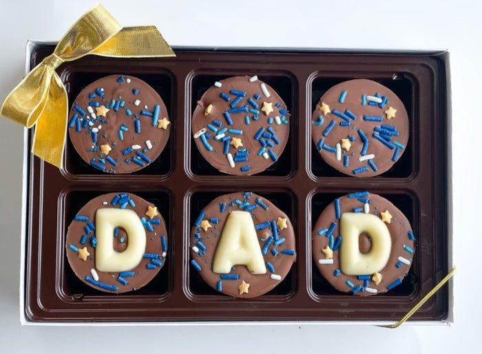 Chocolate Covered Oreos with DAD in chocolate letters